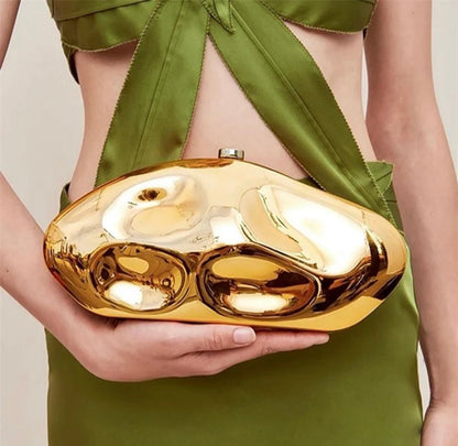ORO VÉLA Statement Clutch