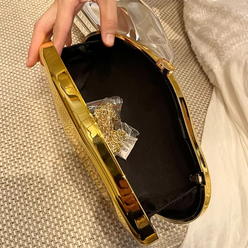 ORO VÉLA Statement Clutch