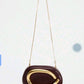 Opulence Arc Clutch Bag